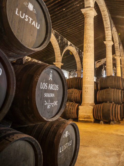 Aging sherry wine using solera criaderas system
